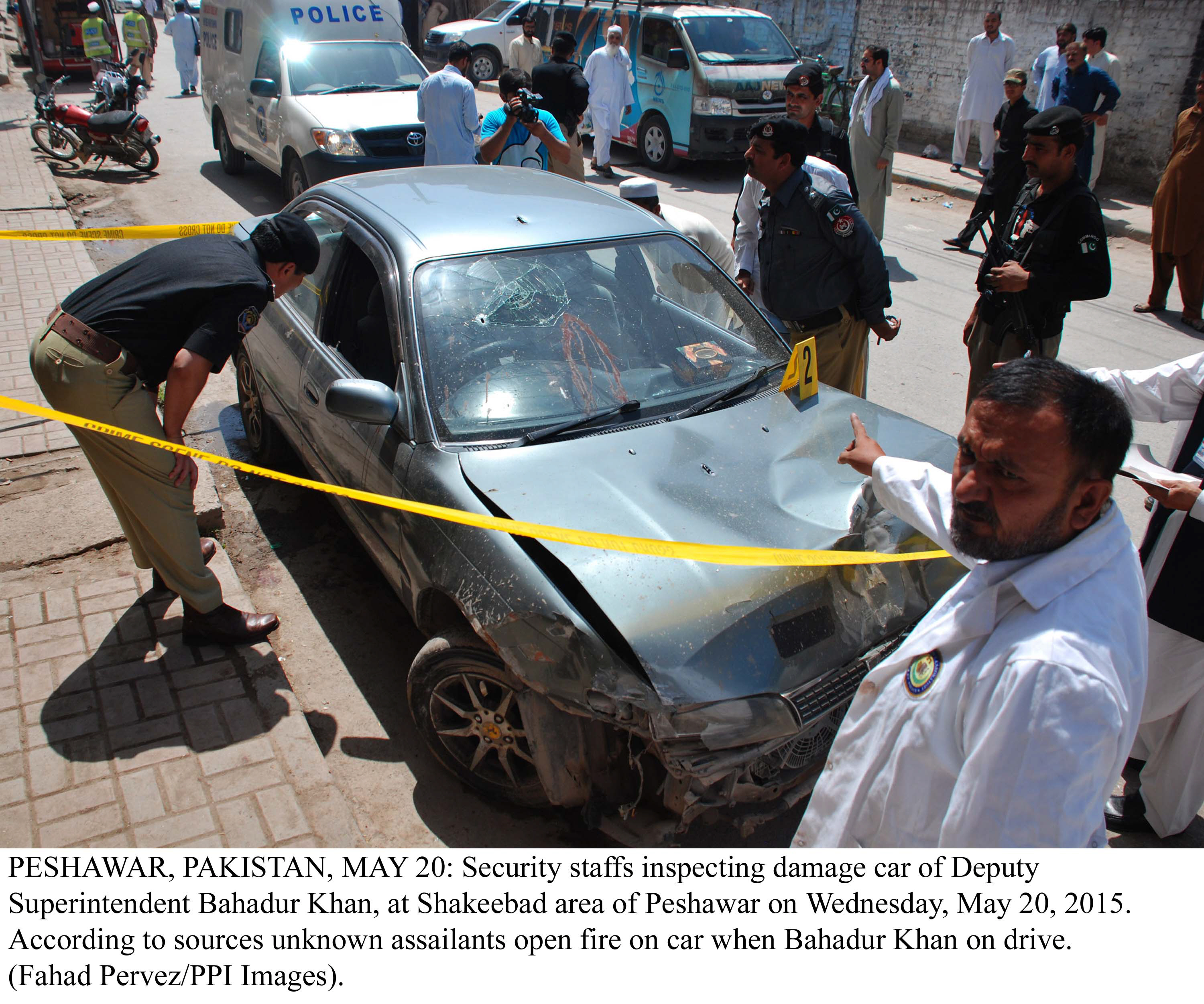 officials inspect dsp bahadur 039 s vehicle after the attack on wednesday photo ppi