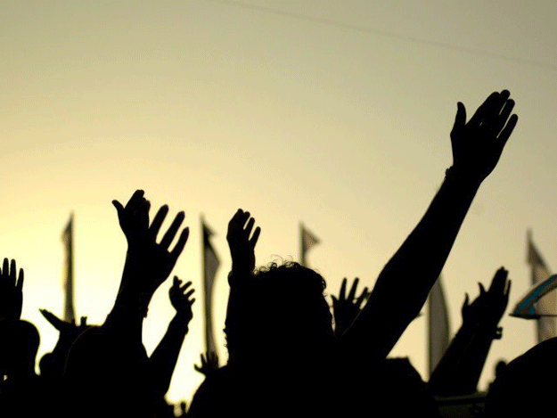 protesters chant slogans urging the government to promote them protesters chant slogans urging the government to promote them