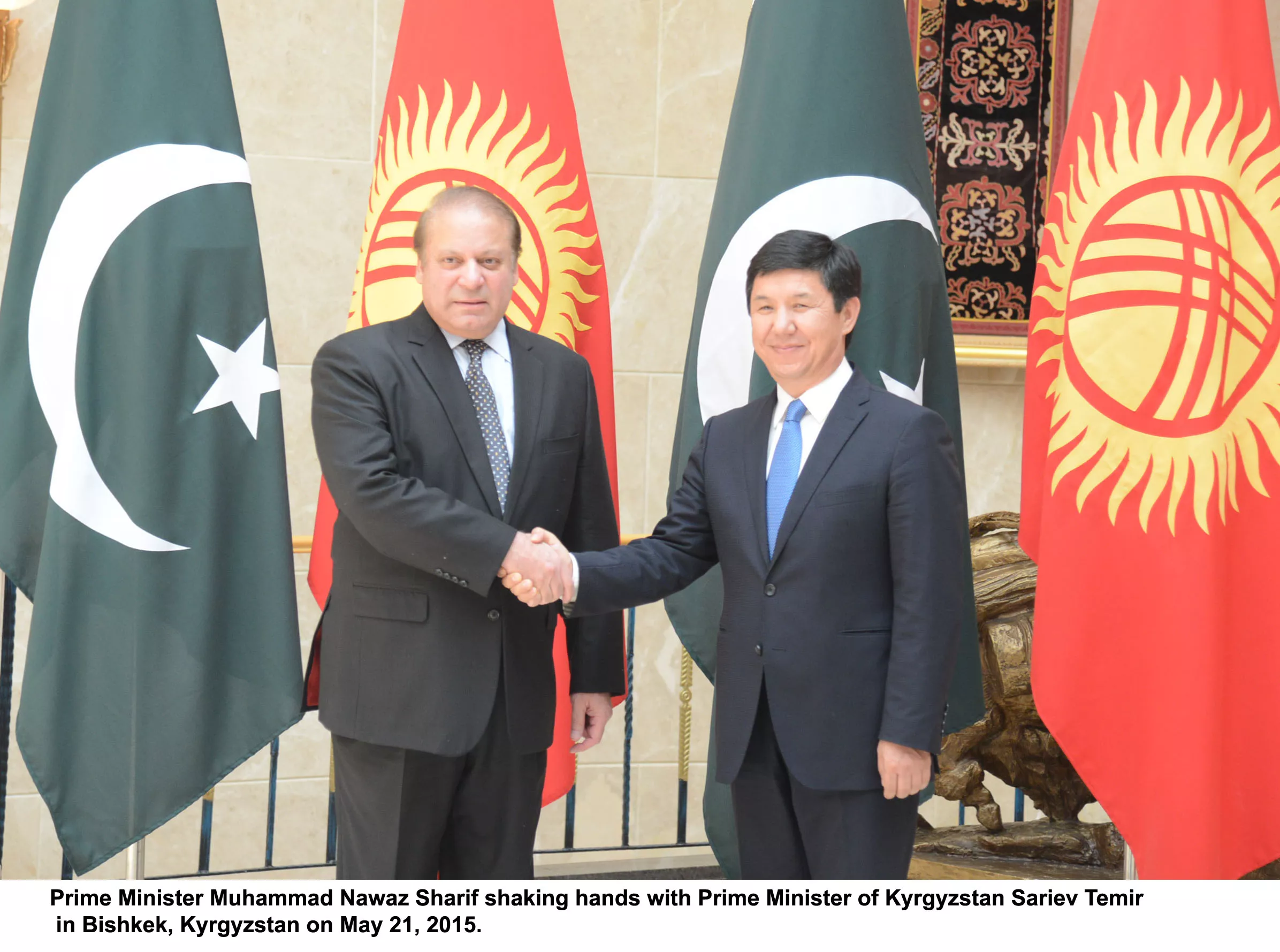 prime minister nawaz sharif shakes hands with prime minister of kyrgyztan sariev temir in bishkek kyrgyztan on may 21 2015 photo pid prime minister nawaz sharif shakes hands with prime minister of kyrgyztan sariev temir in bishkek kyrgyztan on may 21 2015 photo pid