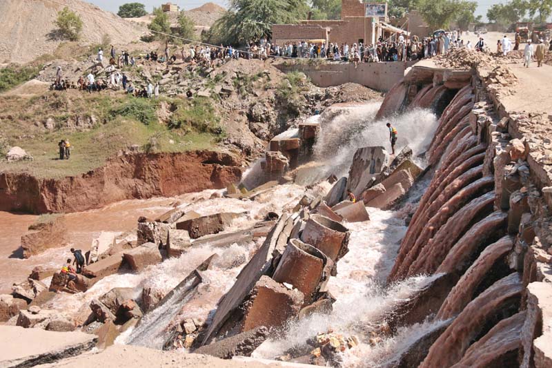 the collapsed bridge over bara khel river photo mumammad iqbal express