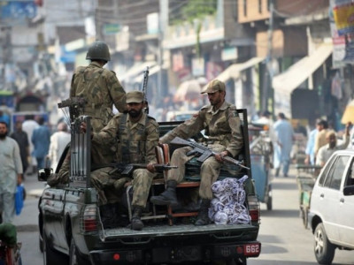 into the second day military troops patrol abbottabad after parking clash escalates