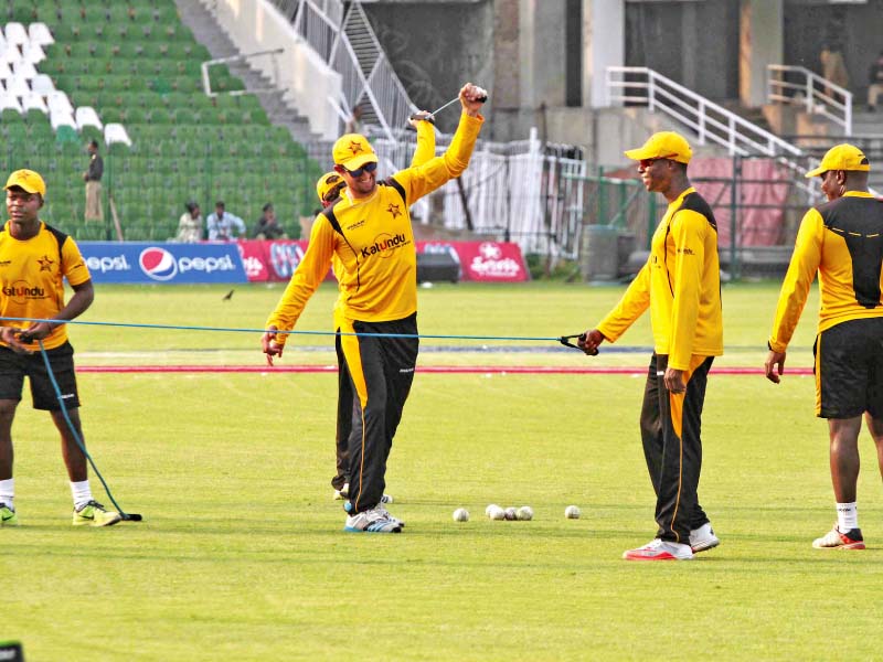 zimbabwe players practice at the gaddafi stadium in lahore where an international side has not visited in six years photo shafiq malik express