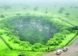 mind the gap tourists drawn to giant sinkholes mind the gap tourists drawn to giant sinkholes