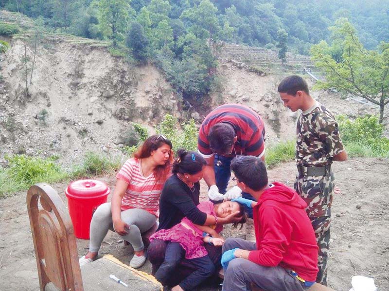 dr talha rehman treats a child in earthquake stricken nepal rehman and noman quadri went to nepal s remotest villages only to help the grieving victims photo courtesy noman quadri