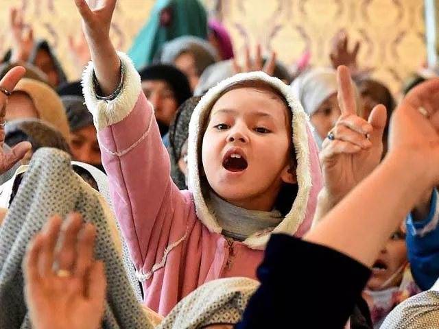 a young girl from quetta during a sit in photo afp a young girl from quetta during a sit in photo afp