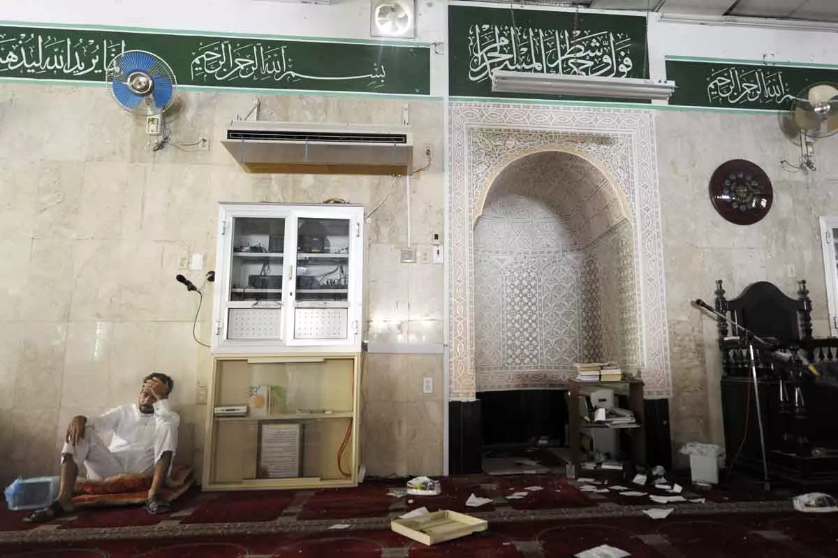 a saudi man reacts following a suicide blast inside a mosque in the saudi town of qatif 400 kms east of riyadh on may 22 2015 photo afp a saudi man reacts following a suicide blast inside a mosque in the saudi town of qatif 400 kms east of riyadh on may 22 2015 photo afp