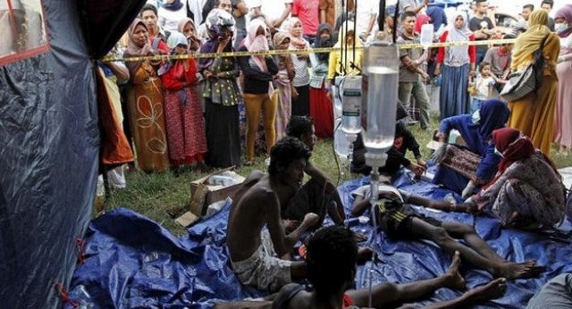 hundreds of rohingya and bangladeshi migrants abandoned by people smugglers at sea have been rescued and brought to indonesia photo reuters hundreds of rohingya and bangladeshi migrants abandoned by people smugglers at sea have been rescued and brought to indonesia photo reuters