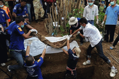 tragedy in southeast malaysia discovers mass graves of migrants