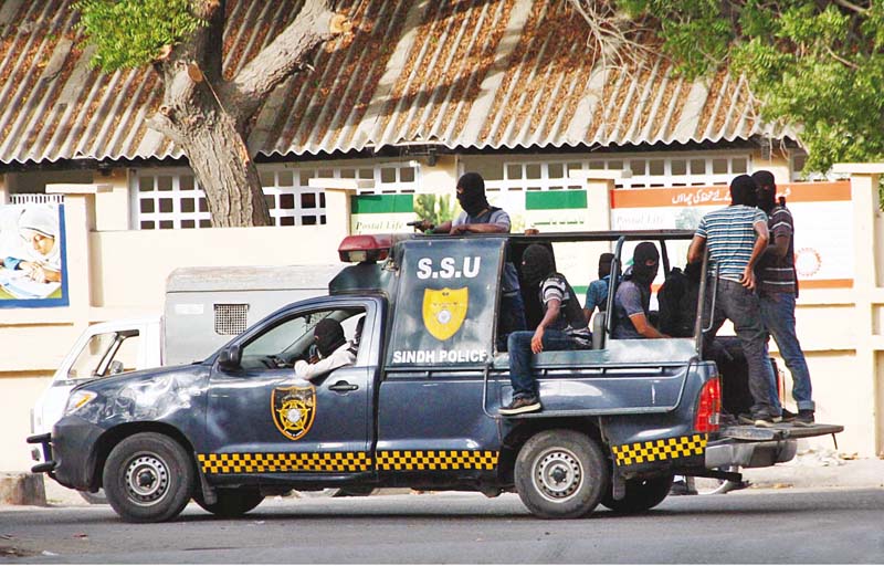 these masked men in plain clothes surrounded the high court premises on saturday and allegedly beat up the guards of dr zulfiqar mirza as well as media personnel the court asked on monday to police the disclose the identities of these men photo online