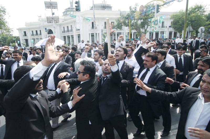 hundreds of lawyers took to the mall where they held a sit in for three hours on monday photo shafiq malik express