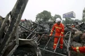 firefighters clean up the debris after a fire at a rehabilitation centre for the elderly in sanlihe village of pingdingshan henan province china may 26 2015 photo reuters firefighters clean up the debris after a fire at a rehabilitation centre for the elderly in sanlihe village of pingdingshan henan province china may 26 2015 photo reuters