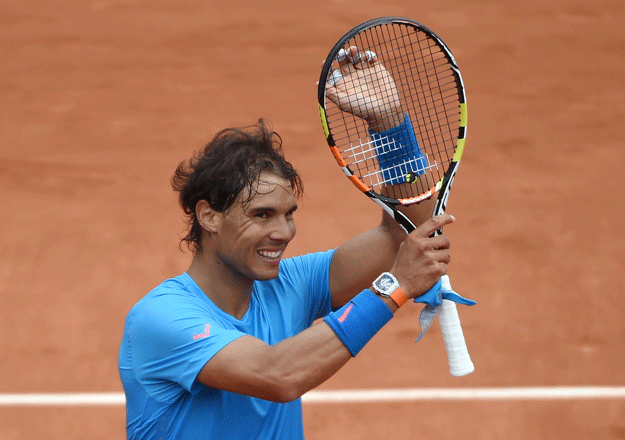 spain 039 s rafael nadal celebrates after defeating france 039 s quentin halys during the men 039 s first round at the roland garros 2015 french tennis open in paris on may 26 2015 photo afp