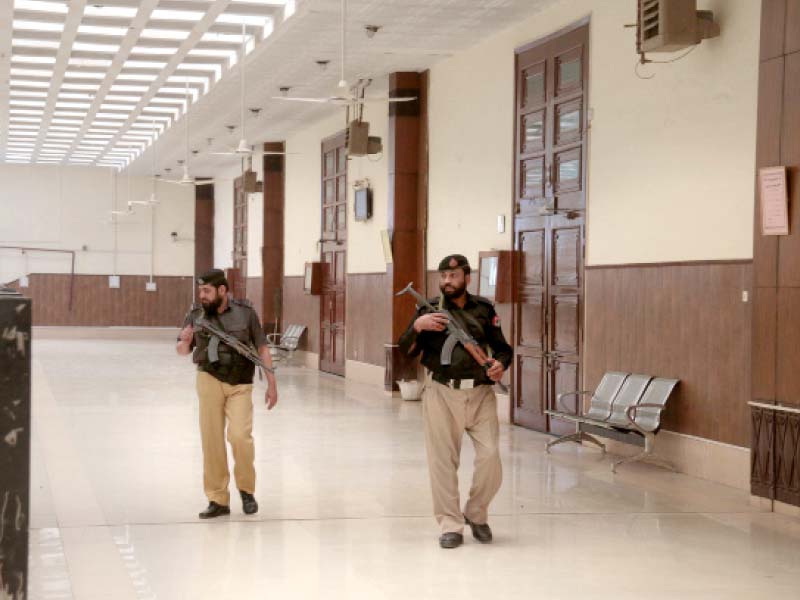 police officials patrol the bar rooms where the meeting was held photo muhammad iqbal express