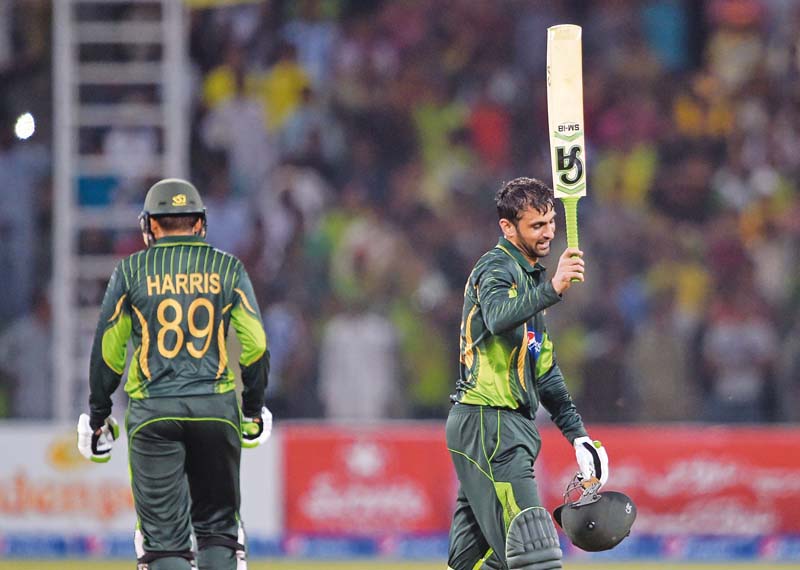 shoaib malik celebrates his first century in five years as he led pakistan to a daunting 375 in lahore photo afp