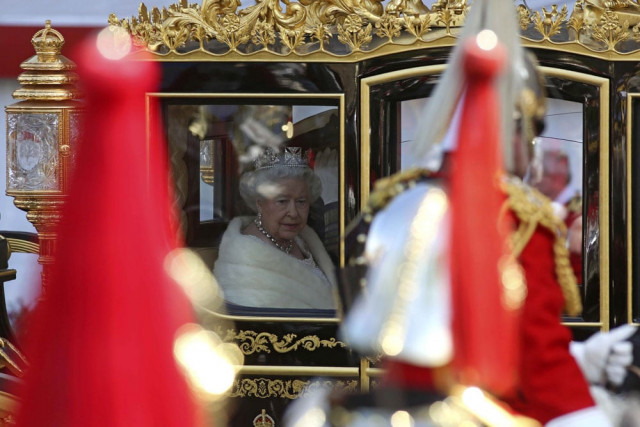 britain 039 s queen elizabeth ii l and prince philip duke of edinburgh r ride in the diamond jubilee state coach from buckingham palace to the palace of westminster in central london on may 27 2015 for the state opening of parliament the state opening of parliament marks the formal start of the parliamentary year and the queen 039 s speech sets out the government s agenda for the coming session photo afp britain 039 s queen elizabeth ii l and prince philip duke of edinburgh r ride in the diamond jubilee state coach from buckingham palace to the palace of westminster in central london on may 27 2015 for the state opening of parliament the state opening of parliament marks the formal start of the parliamentary year and the queen 039 s speech sets out the government s agenda for the coming session photo afp