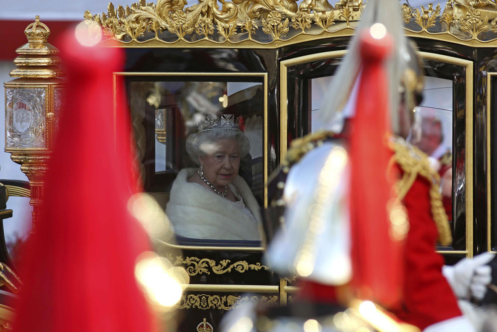 britain 039 s queen elizabeth ii l and prince philip duke of edinburgh r ride in the diamond jubilee state coach from buckingham palace to the palace of westminster in central london on may 27 2015 for the state opening of parliament the state opening of parliament marks the formal start of the parliamentary year and the queen 039 s speech sets out the government s agenda for the coming session photo afp