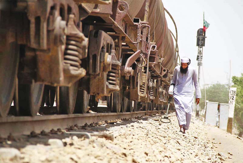 a bds official examines the track near hussainabad in hyderabad on which a cracker was thrown photo online