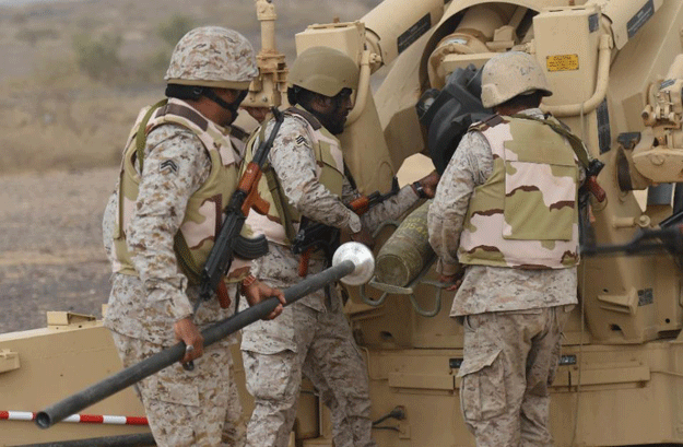 saudi soldiers load an artillery piece at a position close to the saudi yemeni border in southwestern saudi arabia on april 13 2015 photo afp