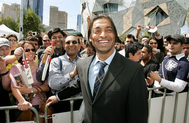 a file photo of shoaib akhtar smiling with his fans photo afp
