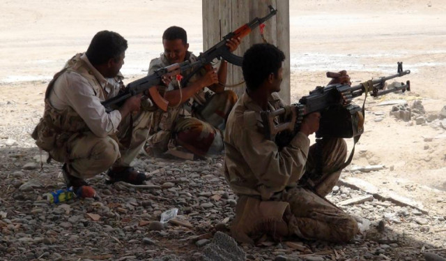 militiamen loyal to yemen 039 s fugitive president abderabbo mansour hadi hold a position during clashes with opponents and huthi rebels in the port city of aden 039 s dar saad suburb on may 28 2015 photo afp