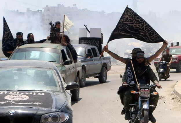 fighters from al qaeda 039 s syrian affiliate al nusra front drive in the northern syrian city of aleppo flying islamist flags as they head to a frontline on may 26 2015 photo afp fighters from al qaeda 039 s syrian affiliate al nusra front drive in the northern syrian city of aleppo flying islamist flags as they head to a frontline on may 26 2015 photo afp