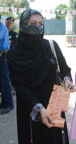 a voter in charsadda shows a torn ballot paper photo sameer raziq express a voter in charsadda shows a torn ballot paper photo sameer raziq express
