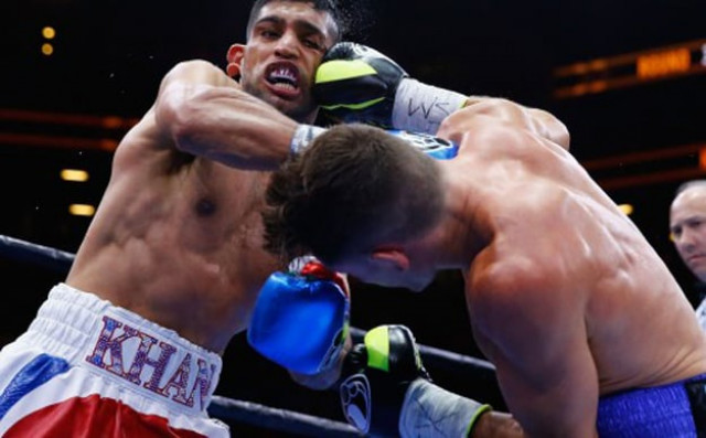 amir khan in action against chris algieri photo afp amir khan in action against chris algieri photo afp