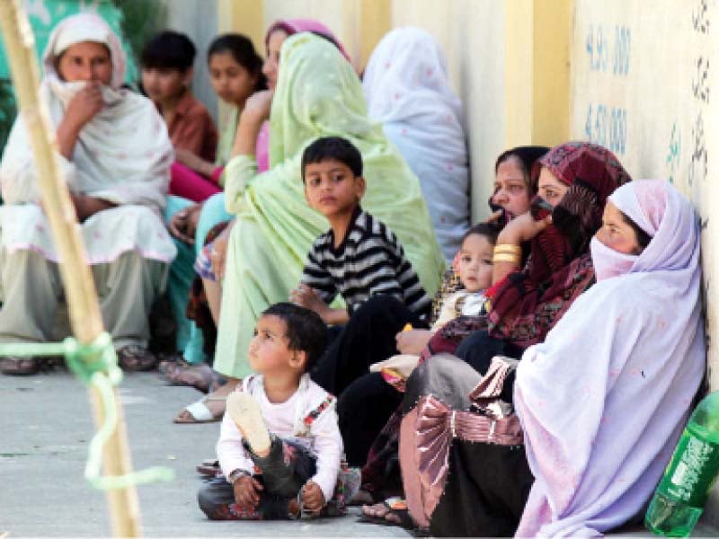 in the absence of seating arrangements at government high school 4 abbottabad voters sit on the floor photo online