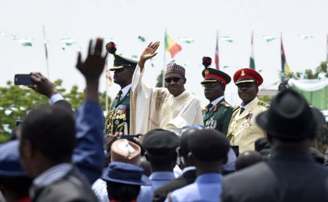 nigerian president muhammadu buhari c waves to the crowd during his inauguration ceremony as president of nigeria in eagle square in abuja nigeria on may 29 2015 us secretary of state john kerry led the us delegation to the inauguration of nigerian president elect muhammadu buhari in abuja buhari was sworn in on may 29 after defeating outgoing president goodluck jonathan in the first nigerian election that saw the opposition candidate defeat an incumbent photo afp nigerian president muhammadu buhari c waves to the crowd during his inauguration ceremony as president of nigeria in eagle square in abuja nigeria on may 29 2015 us secretary of state john kerry led the us delegation to the inauguration of nigerian president elect muhammadu buhari in abuja buhari was sworn in on may 29 after defeating outgoing president goodluck jonathan in the first nigerian election that saw the opposition candidate defeat an incumbent photo afp