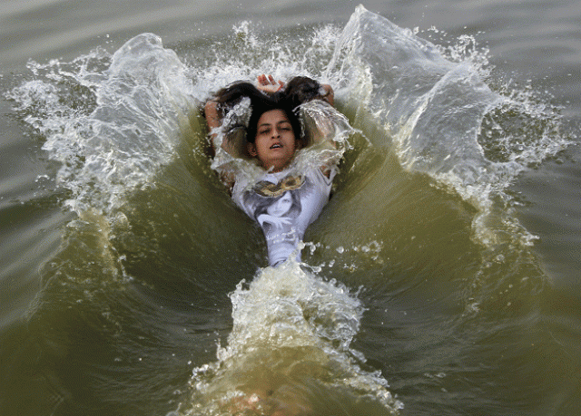 a girl cools off herself in the waters of the river ganges during a hot summer morning in allahabad india may 31 2015 temperature in allahabad on sunday is expected to reach 46 degree celsius 114 8 degree fahrenheit according to india 039 s metrological department website while temperatures regularly top 40 degrees celsius 104 degrees fahrenheit in may and june parts of the south and east of india have baked under heat as high as 47 degrees celsius for seven straight days photo reuters a girl cools off herself in the waters of the river ganges during a hot summer morning in allahabad india may 31 2015 temperature in allahabad on sunday is expected to reach 46 degree celsius 114 8 degree fahrenheit according to india 039 s metrological department website while temperatures regularly top 40 degrees celsius 104 degrees fahrenheit in may and june parts of the south and east of india have baked under heat as high as 47 degrees celsius for seven straight days photo reuters