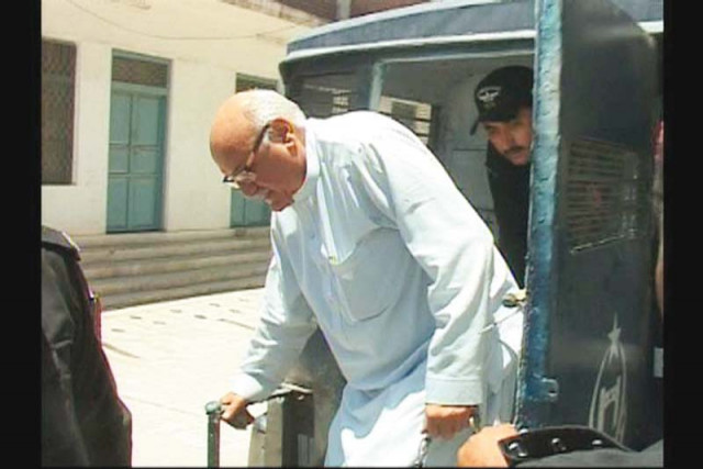 mian iftikhar arrives at a court in a police van photo express mian iftikhar arrives at a court in a police van photo express