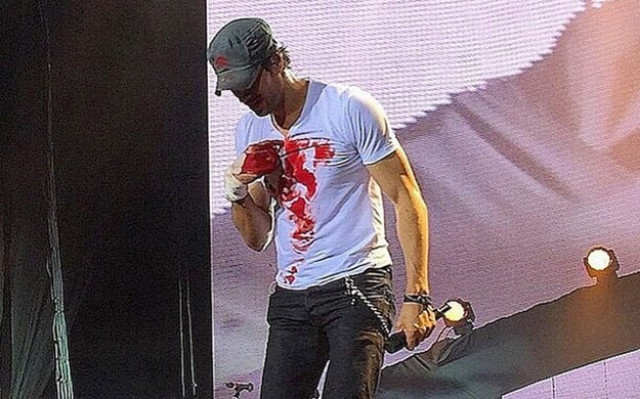 fans who were present at the concert posted photos on social media of iglesias with blood all over his white t shirt photo indiatoday fans who were present at the concert posted photos on social media of iglesias with blood all over his white t shirt photo indiatoday