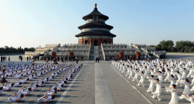 indian prime minister narendra modi and chinese premier li keqiang both center attend a taiji and yoga event at the temple of heaven park in beijing china may 15 2015 indian prime minister narendra modi and chinese premier li keqiang both center attend a taiji and yoga event at the temple of heaven park in beijing china may 15 2015