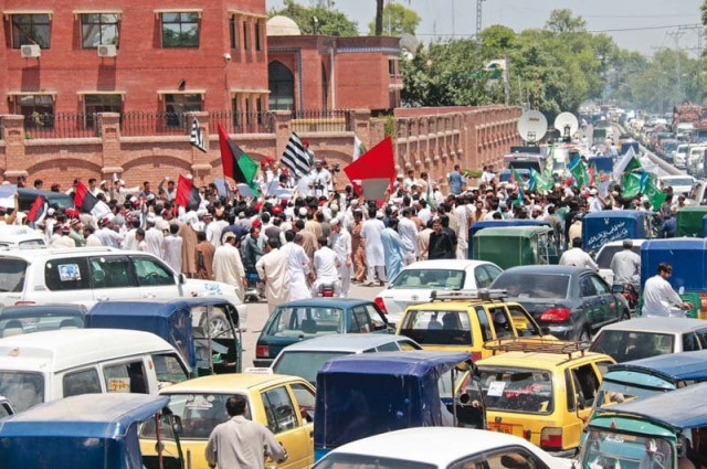 members of different political parties crowd the road outside peshawar press club photo muhammad iqbal express members of different political parties crowd the road outside peshawar press club photo muhammad iqbal express