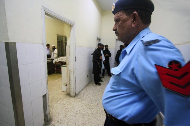 policemen seen at mortuary at pims hospital where body of qadri idrees kashmiri is kept photo s m sohail