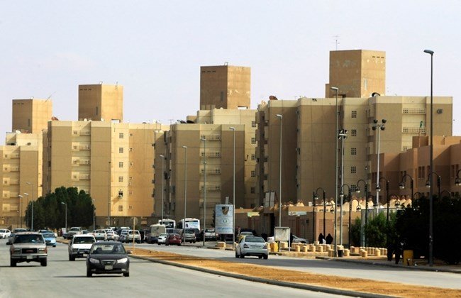 cars drive past a housing compound in south of riyadh december 17 2012 photo reuters