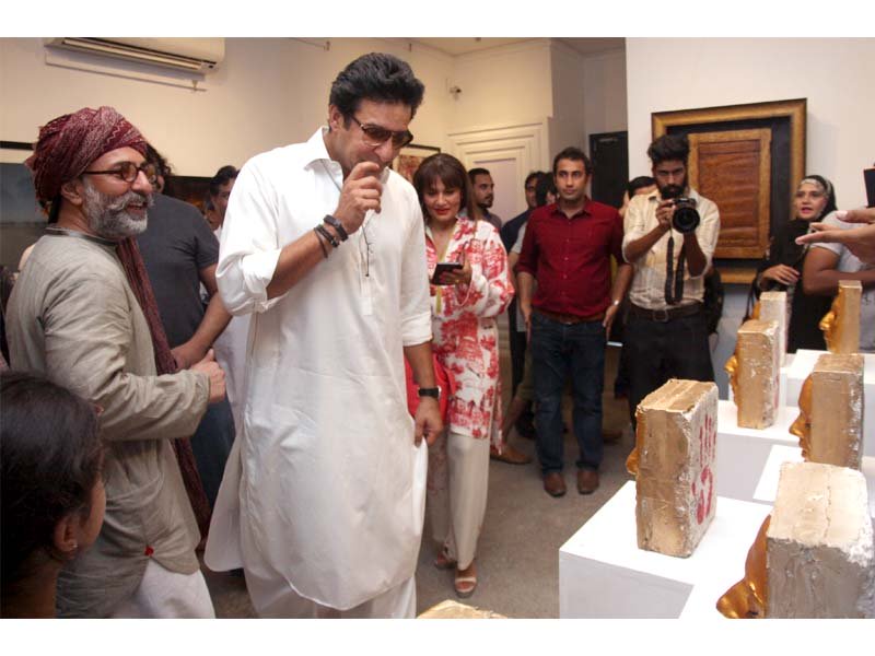 a large number of artists celebrities and art lovers gathered at the opening of yousuf bashir qureshi s exhibition titled recollections at the canvas art gallery on monday his works include photographs paintings installations calligraphy and sculpture photo courtesy canvas art gallery