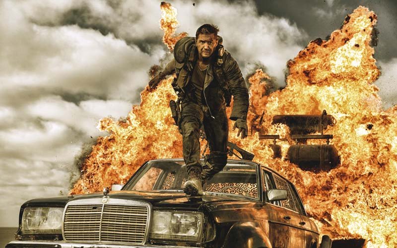 running a chainsaw through clich s mad max fury road deconstructs our expectations of what an action movie should be