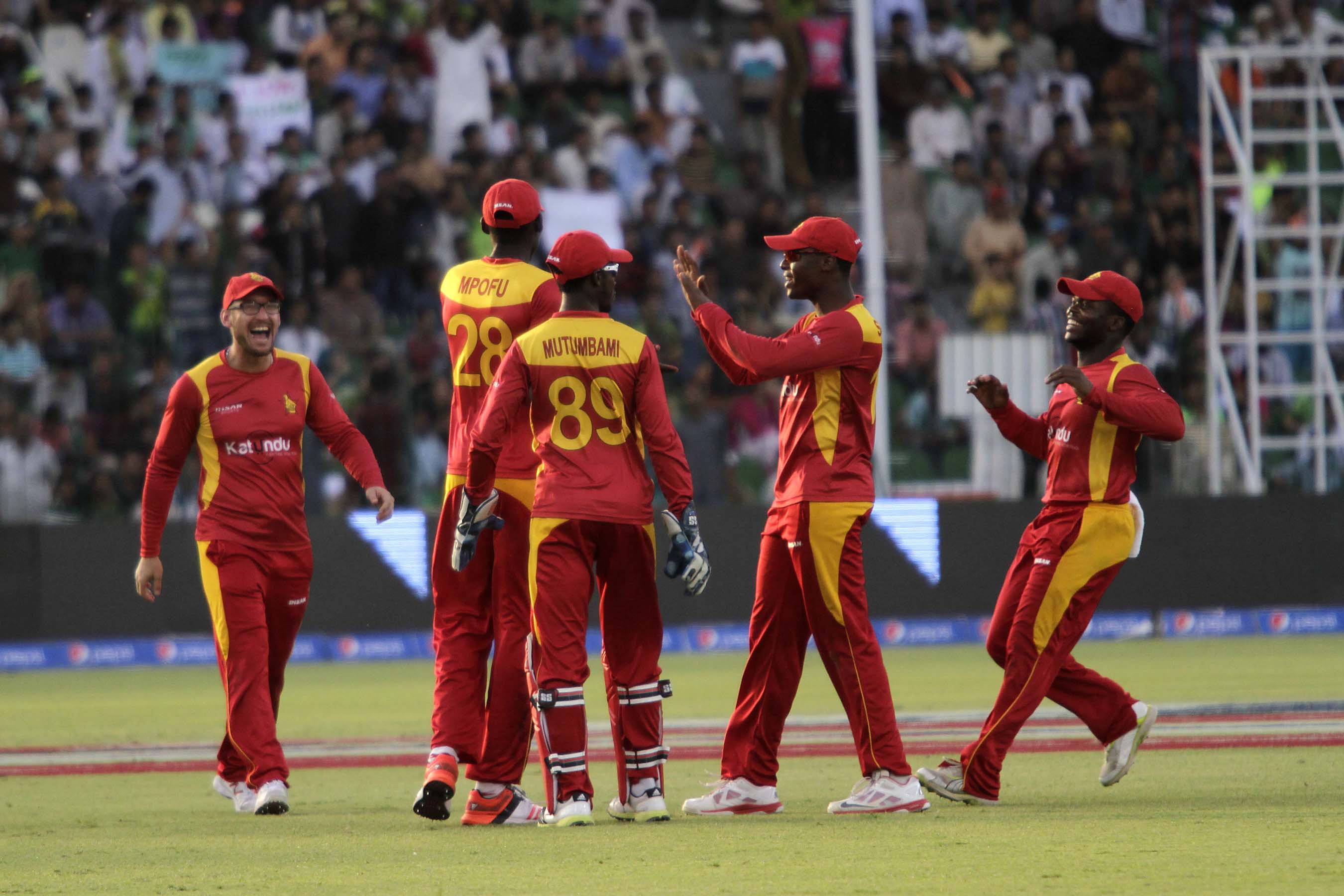 zimbabwe players celebrating a wicket photo shafiq malik express