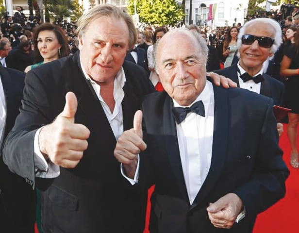 actor gerard depardieu l and fifa president sepp blatter pose at the screening of the film at the 67th cannes film festival in may photo file actor gerard depardieu l and fifa president sepp blatter pose at the screening of the film at the 67th cannes film festival in may photo file