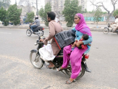 friends of traffic free helmets for karachi s female pillion riders