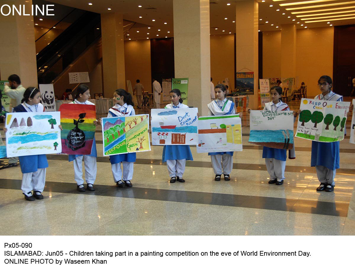 children taking part in a painting competition on the eve of world environment day photo online