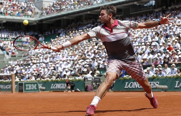 switzerland 039 s stanislas wawrinka hits a return to france 039 s jo wilfried tsonga during their men 039 s semi final match of the roland garros 2015 french tennis open in paris on june 5 2015 afp photo patrick kovarik