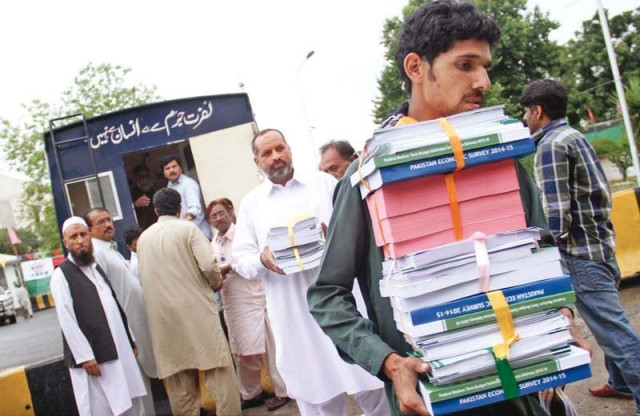 after unloading the budget documents from a prison van a staff member carries them to parliament where finance minister ishaq dar presented the budget for the fiscal 2015 16 on friday photo inp after unloading the budget documents from a prison van a staff member carries them to parliament where finance minister ishaq dar presented the budget for the fiscal 2015 16 on friday photo inp