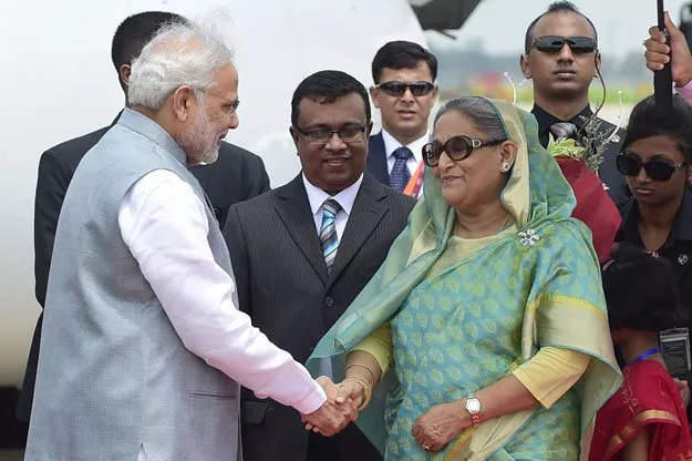 bangladeshi prime minister sheikh hasina wajid r welcomes her indian counterpart narendra modi l at the hazrat shahjalal international airport in dhaka on june 6 2015 photo afp bangladeshi prime minister sheikh hasina wajid r welcomes her indian counterpart narendra modi l at the hazrat shahjalal international airport in dhaka on june 6 2015 photo afp