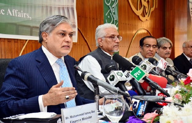 finance minister ishaq dar addressing a press conference photo express