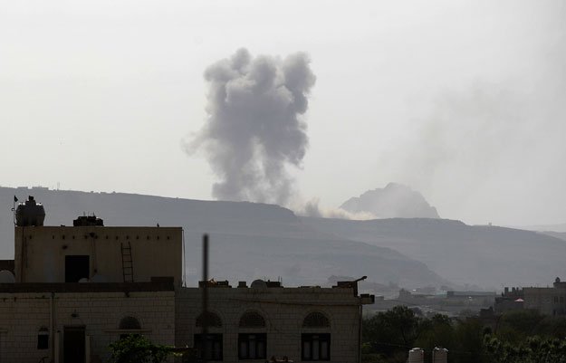 smoke billows following an air strike by the saudi led coalition on an army arms depot now under huthi rebel control on june 7 2015 east of the yemeni capital sanaa photo afp