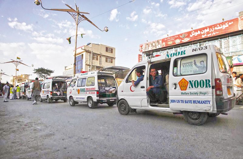 ambulances carry the bodies of slain hazara men photo online