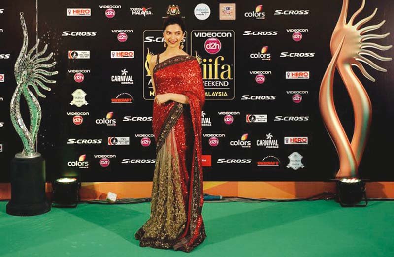 deepika didn t win in the acting category but bagged the woman of the year award photos afp
