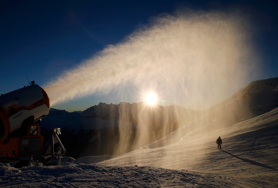 Snowmaker Jose Martinez of the Verbier ski resort checks the artificial snow making machine in Verbier, Switzerland, November 28, 2016. REUTERS/Denis Balibouse